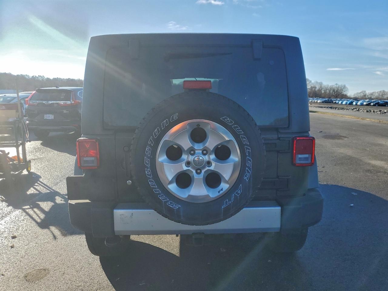 2015 Jeep Wrangler Unlimited Sahara VIN: 1C4BJWEG6FL558893 Lot: 94059555