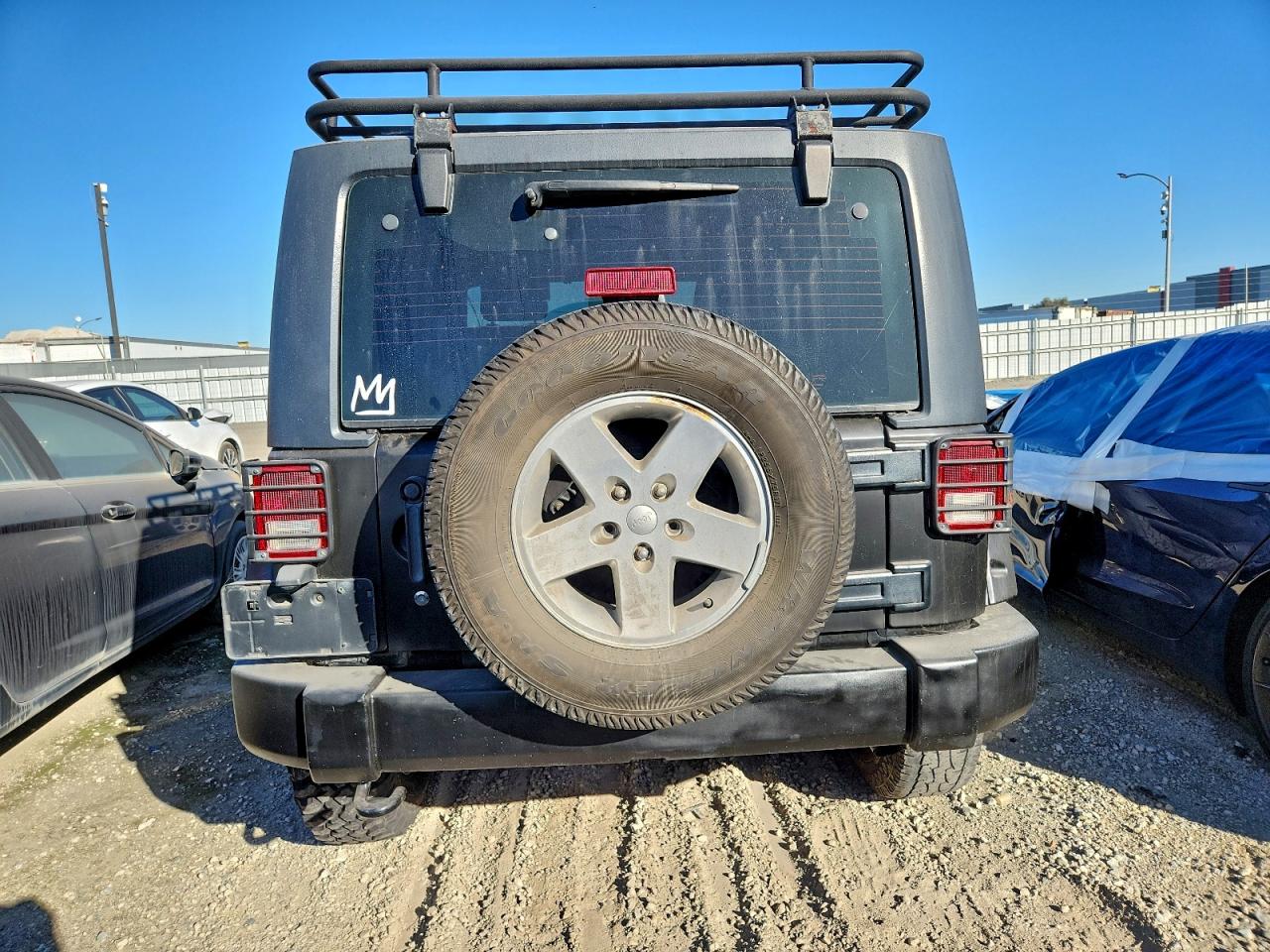 2011 Jeep Wrangler Sport VIN: 1J4AA2D17BL582545 Lot: 93318275