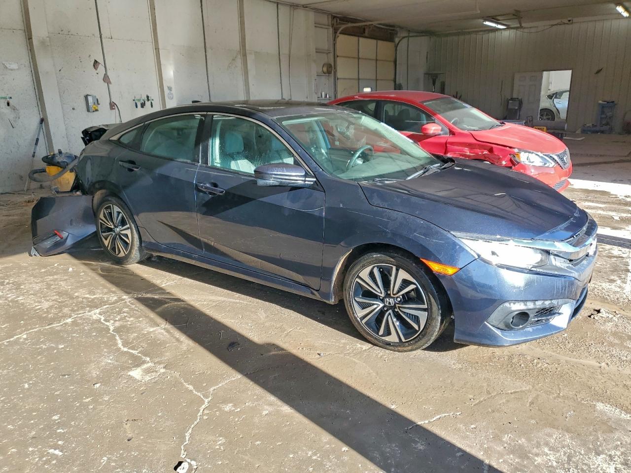 2017 Honda Civic Exl VIN: 19XFC1F73HE003473 Lot: 97777875