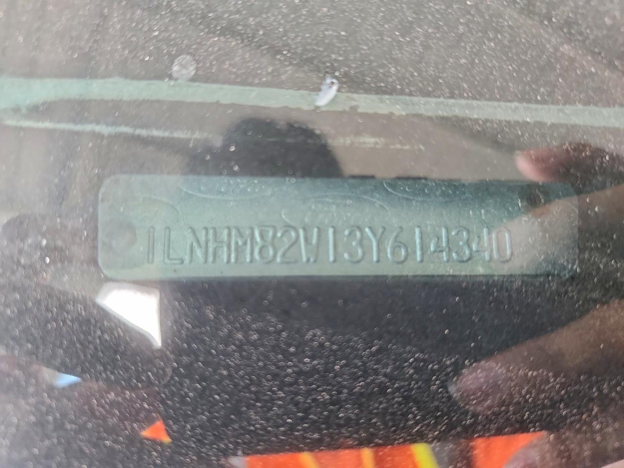 2003 Lincoln Town Car Signature VIN: 1LNHM82W13Y614340 Lot: 95391875