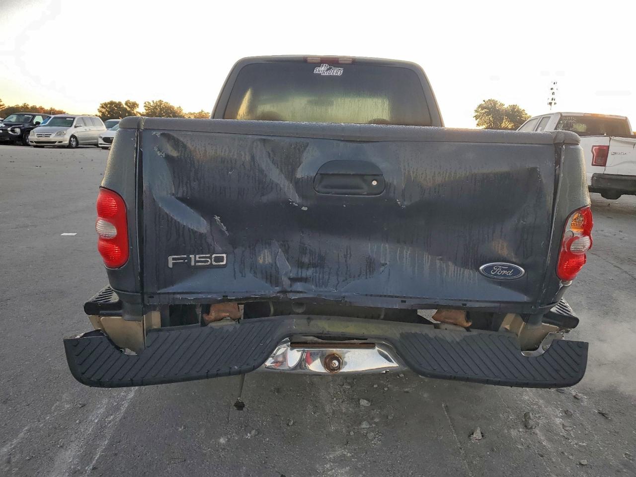 1999 Ford F150 VIN: 1FTRX07W2XKC02303 Lot: 95700445