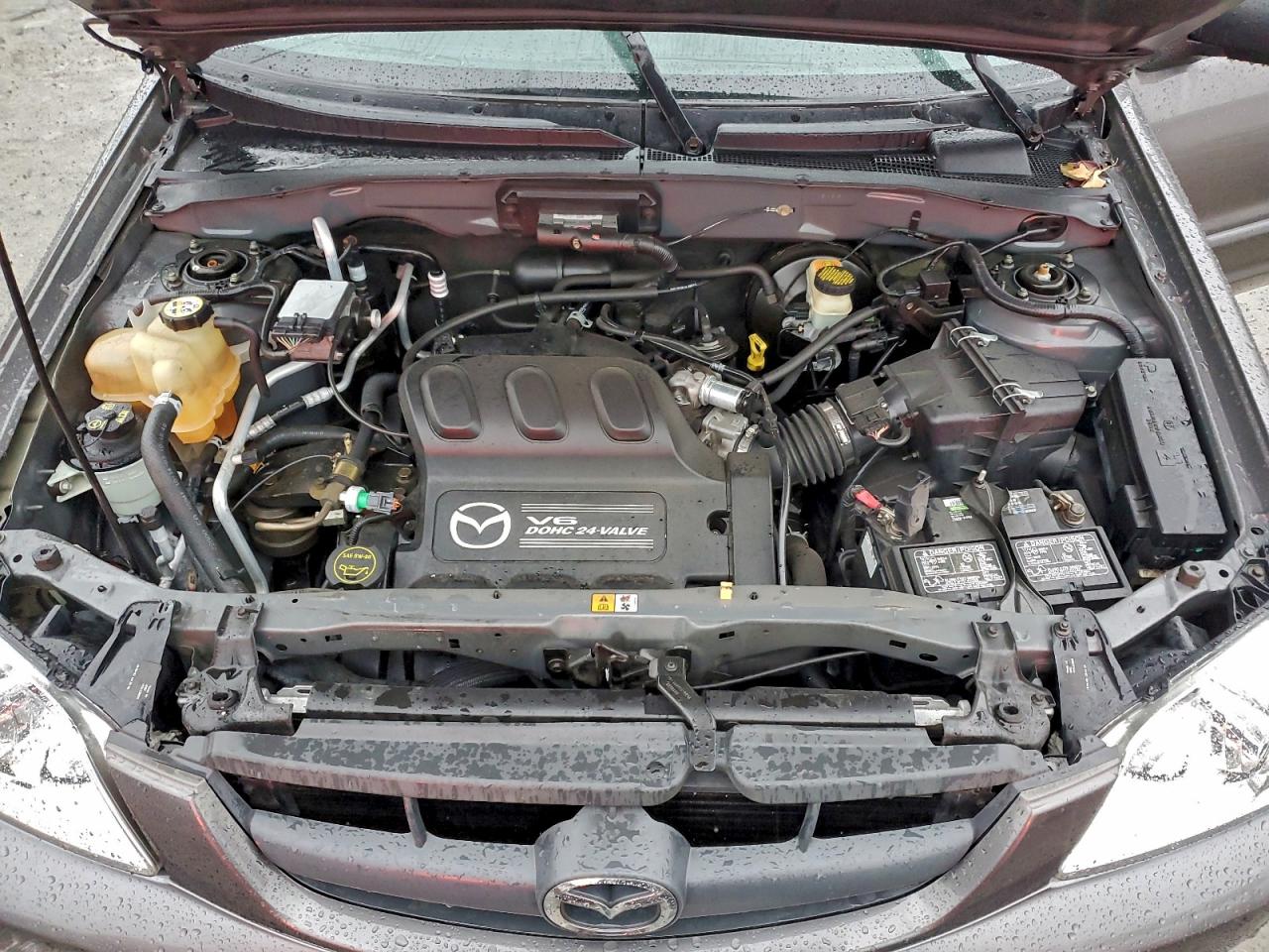 2004 Mazda Tribute Lx VIN: 4F2CZ94114KM27417 Lot: 95513175