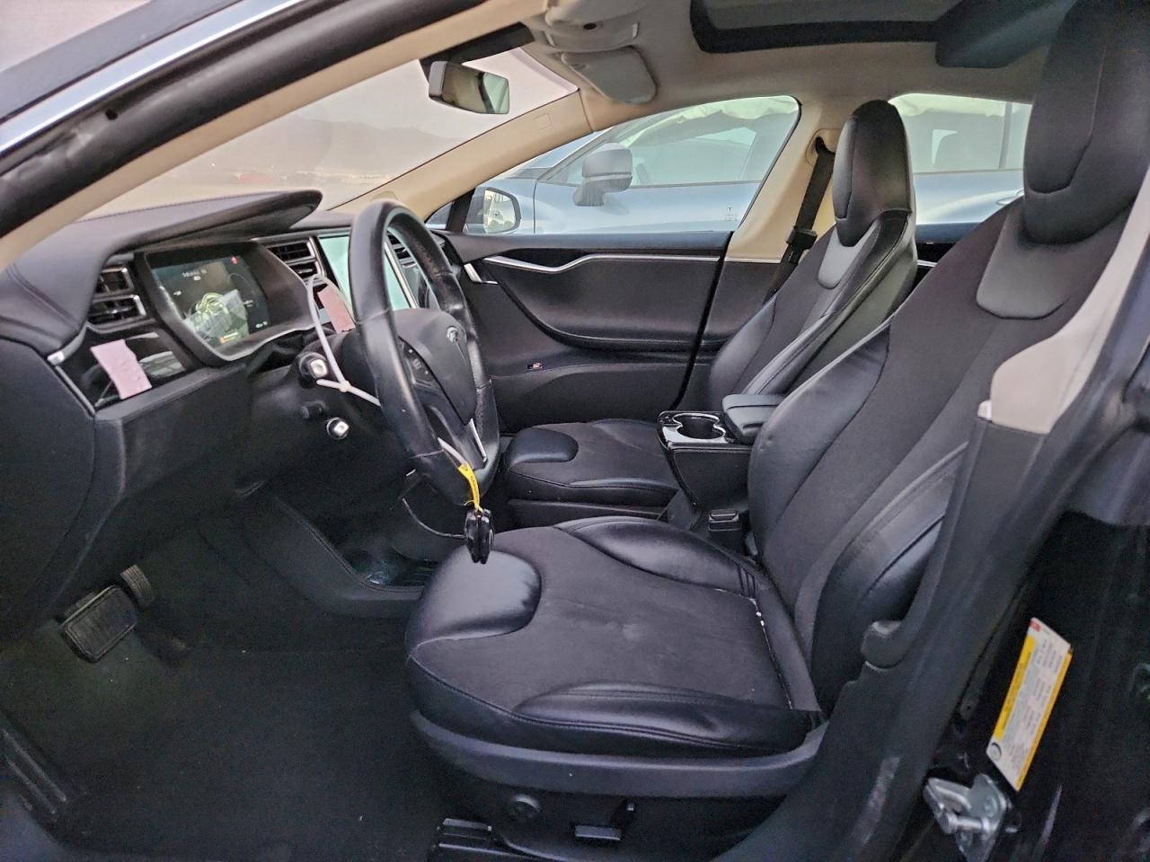 2014 Tesla Model S VIN: 5YJSA1H14EFP63401 Lot: 94279445