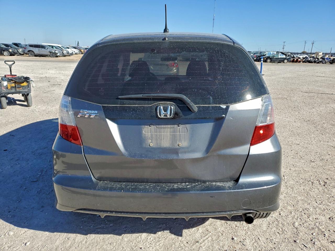 2011 Honda Fit VIN: JHMGE8H38BC025709 Lot: 94920045