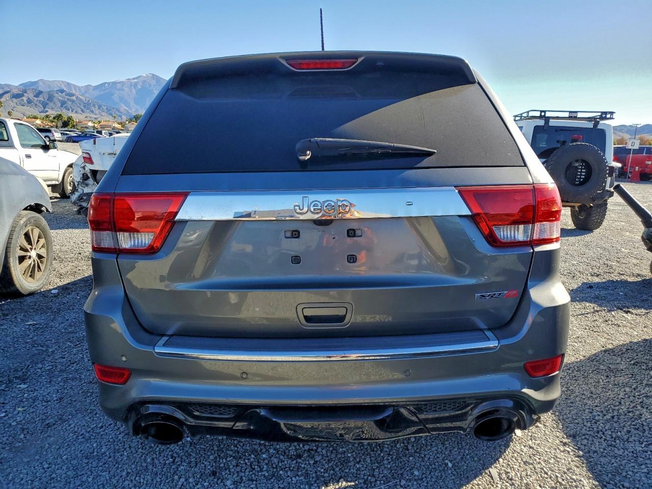 2012 Jeep Grand Cherokee Srt-8 VIN: 1C4RJFDJ7CC104627 Lot: 94927675