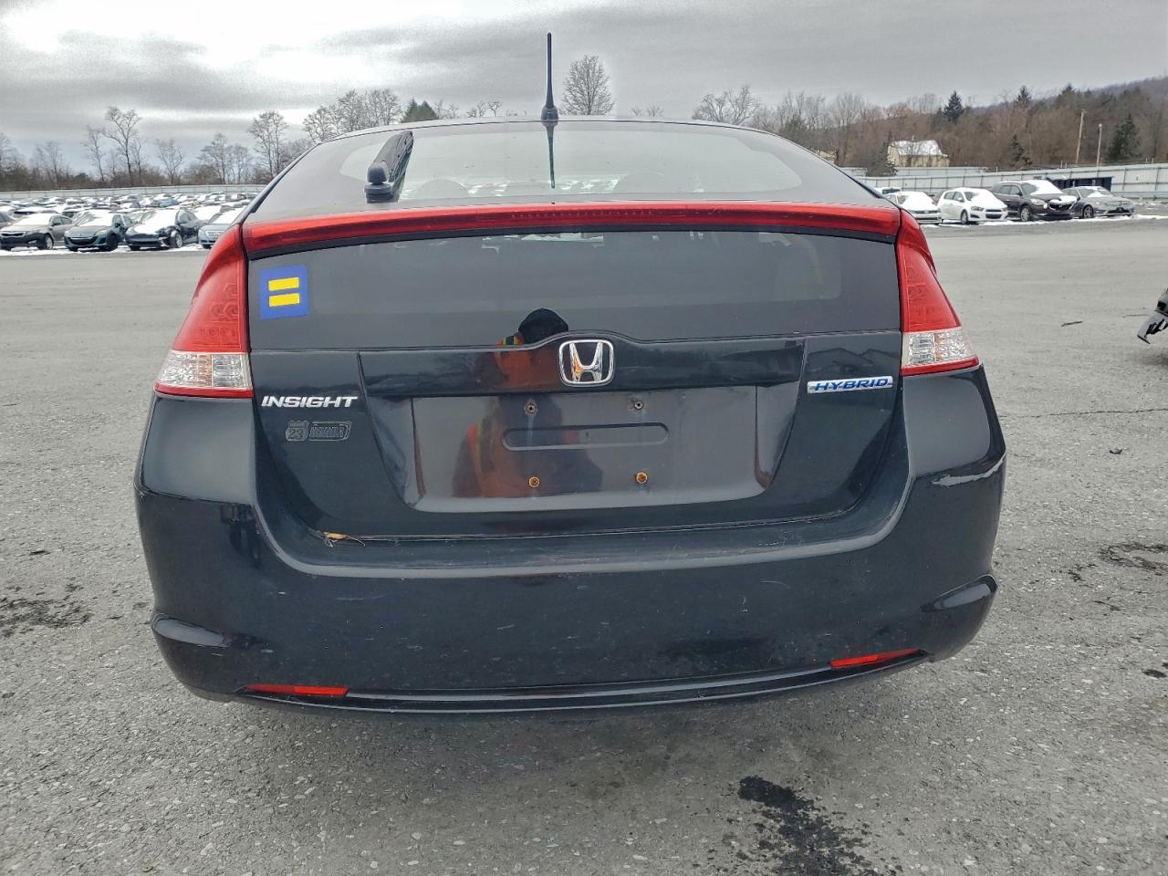 2010 Honda Insight Ex VIN: JHMZE2H77AS023561 Lot: 95924945