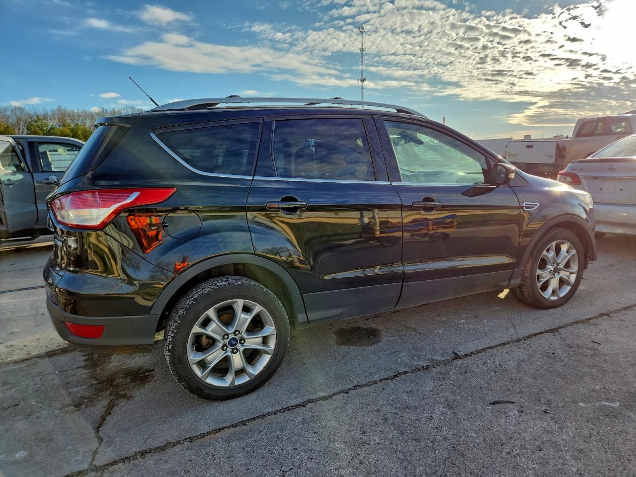 2014 Ford Escape Titanium VIN: 1FMCU0JX1EUD08769 Lot: 94525525
