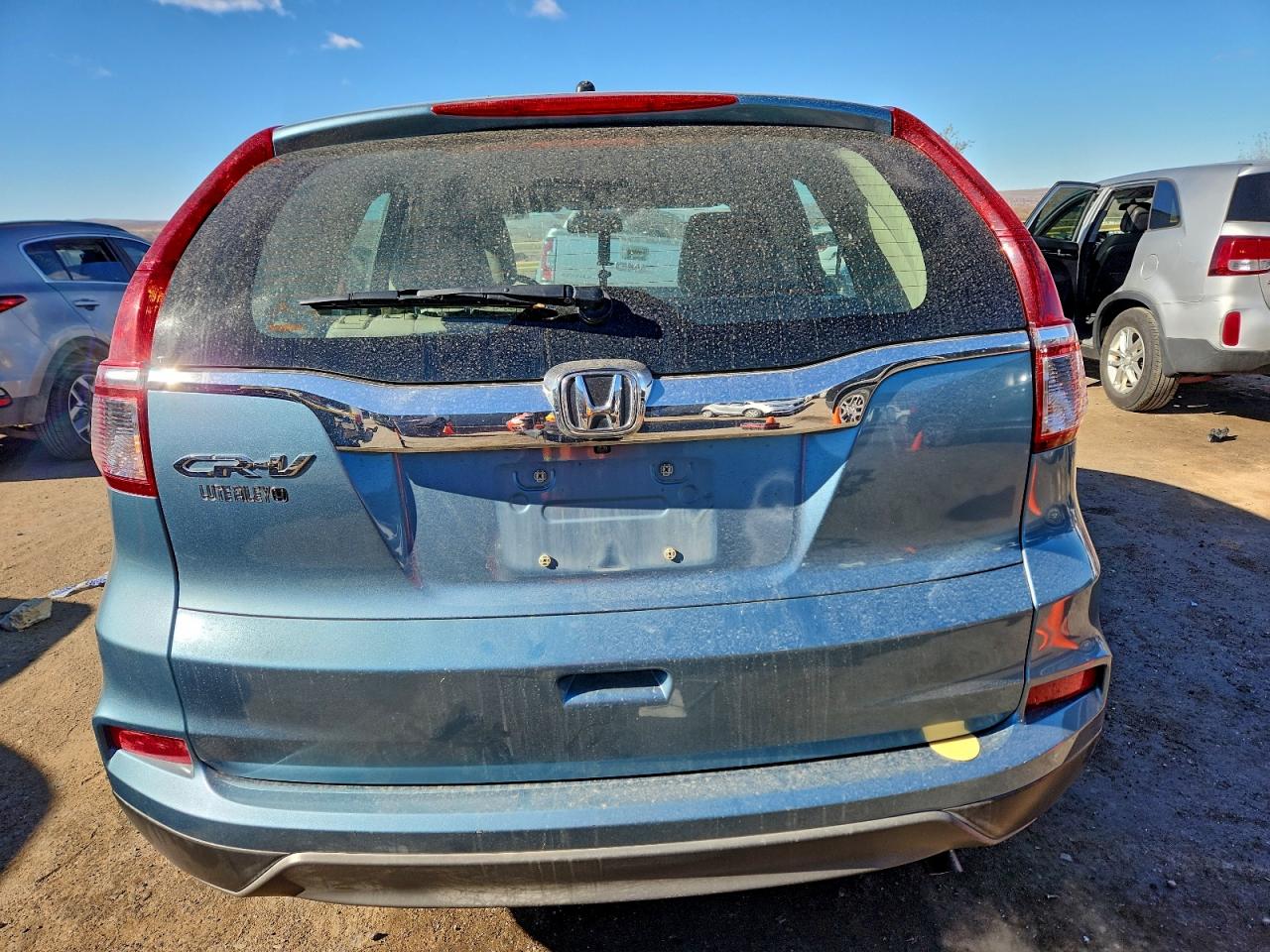 2015 Honda Cr-V Lx VIN: 2HKRM3H38FH559951 Lot: 94170635