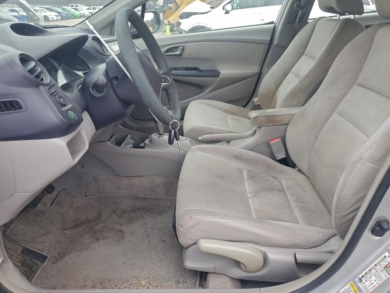 2010 Honda Insight Lx VIN: JHMZE2H59AS041557 Lot: 95313685