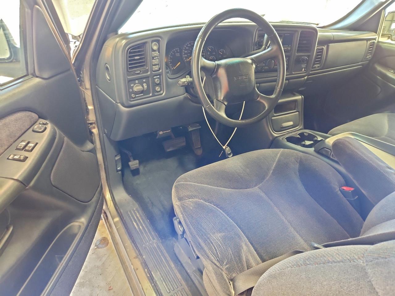 2001 GMC New Sierra K1500 VIN: 1GTEK19TX1E165870 Lot: 95553205