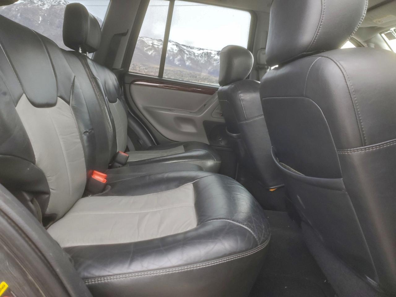 2004 Jeep Grand Cherokee Overland VIN: 1J8GW68J24C312248 Lot: 97385765