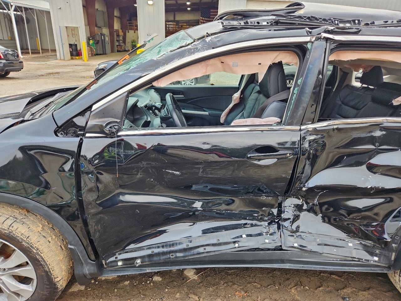 2014 Honda Cr-V Exl VIN: 2HKRM4H70EH699712 Lot: 94231705