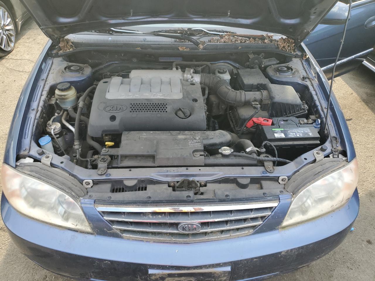 KNAFB121225207704 2002 Kia Spectra Base