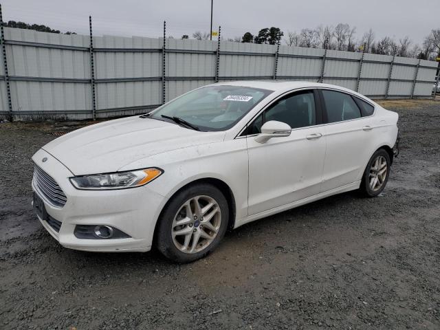 Lot #2454683452 2013 FORD FUSION SE salvage car