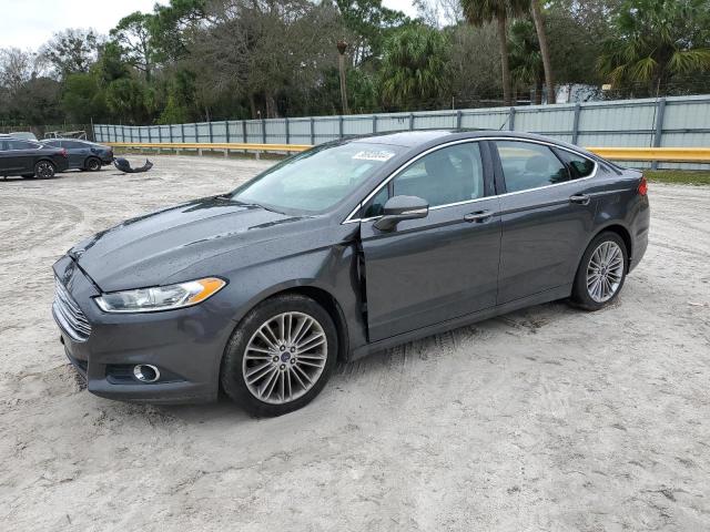 Lot #2471322908 2015 FORD FUSION SE salvage car