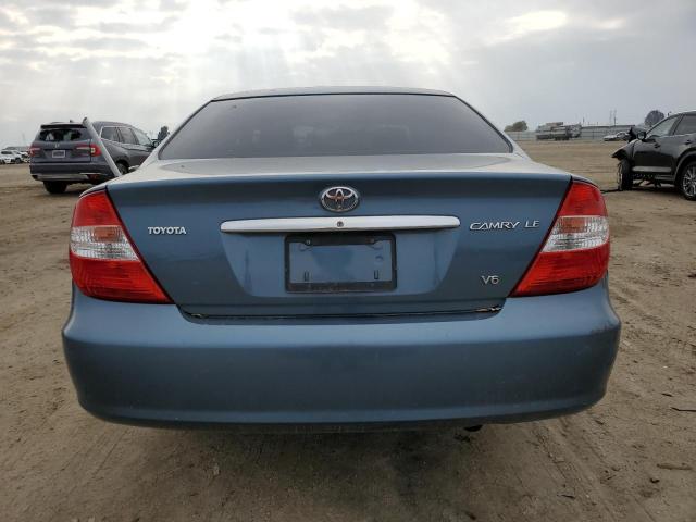 2004 Toyota Camry Le VIN: 4T1BF32K34U587795 Lot: 37824354