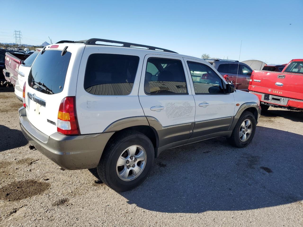 4F2CZ961X3KM33597 2003 Mazda Tribute Es