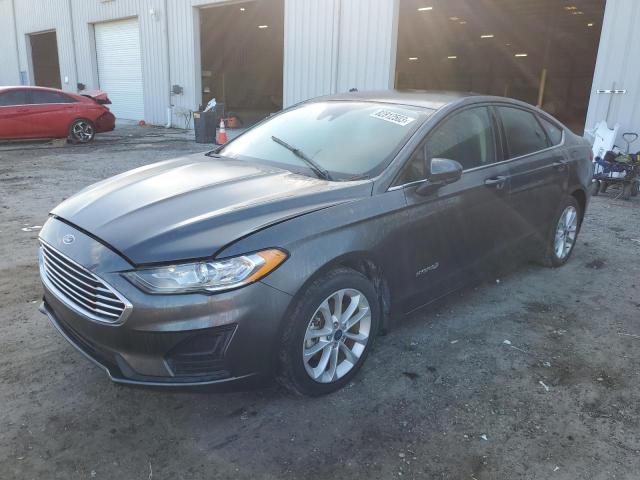 Lot #2457554289 2019 FORD FUSION SE salvage car