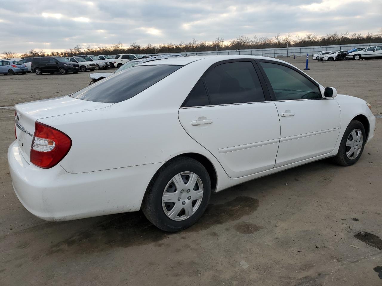 JTDBE32K730233985 2003 Toyota Camry Le