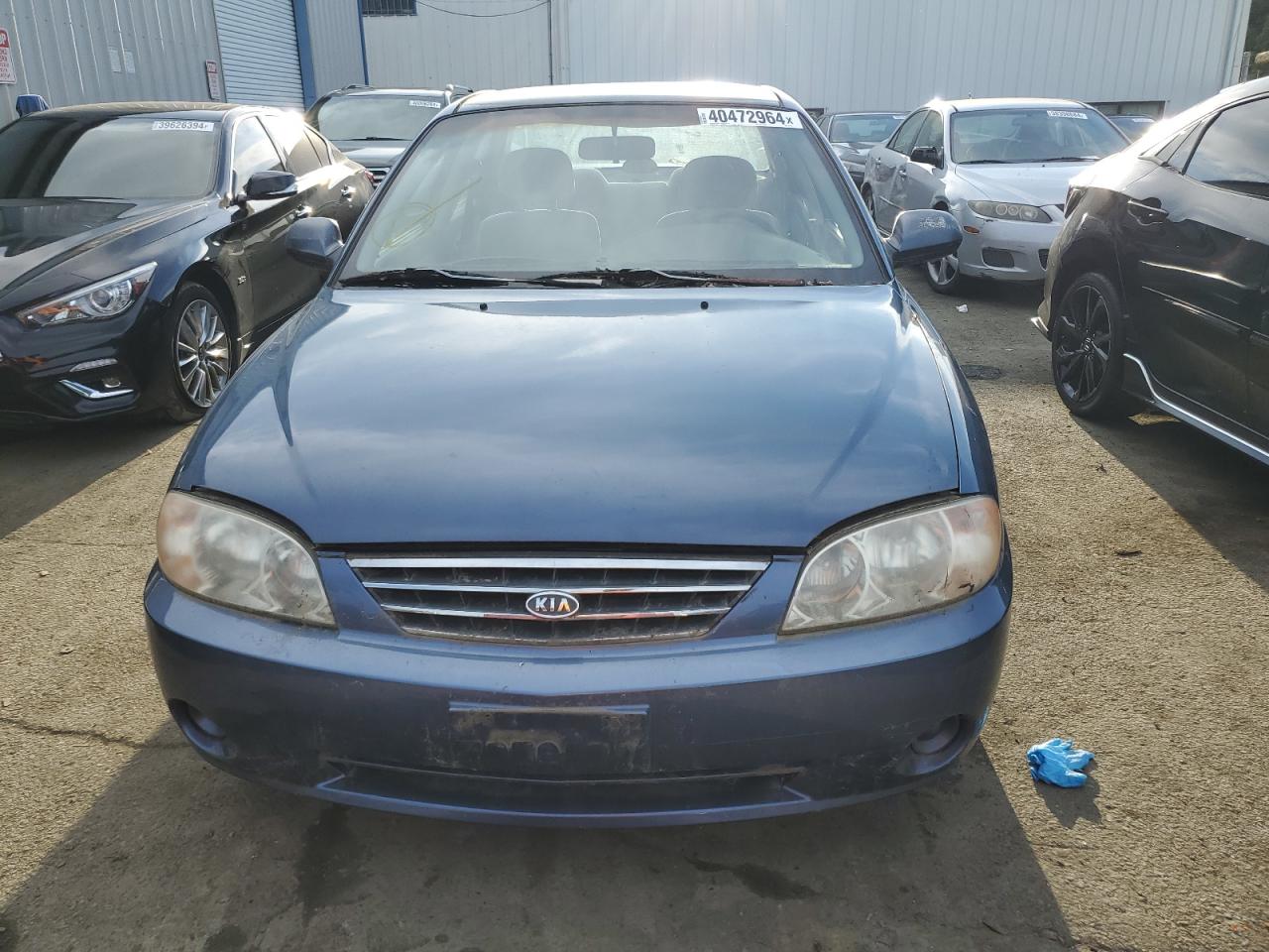 KNAFB121225207704 2002 Kia Spectra Base