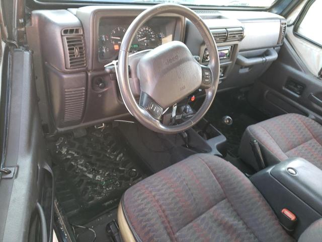 2000 Jeep Wrangler / Tj Sport VIN: 1J4FA49S9YP753980 Lot: 82529083