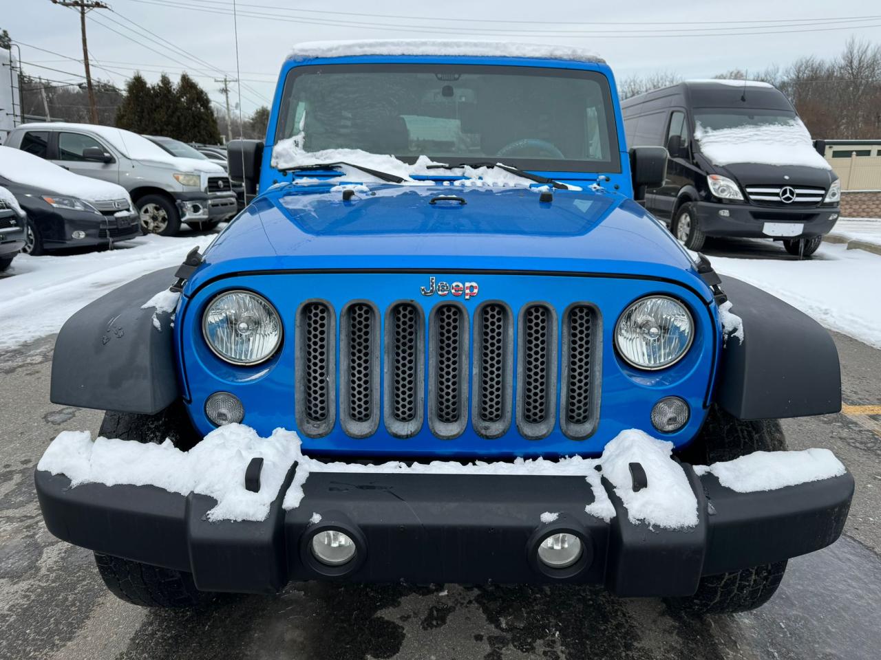 1C4BJWDG2FL520398 2015 Jeep Wrangler Unlimited Sport