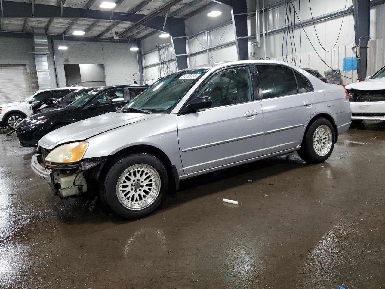 1HGES16542L013619 2002 Honda Civic Lx