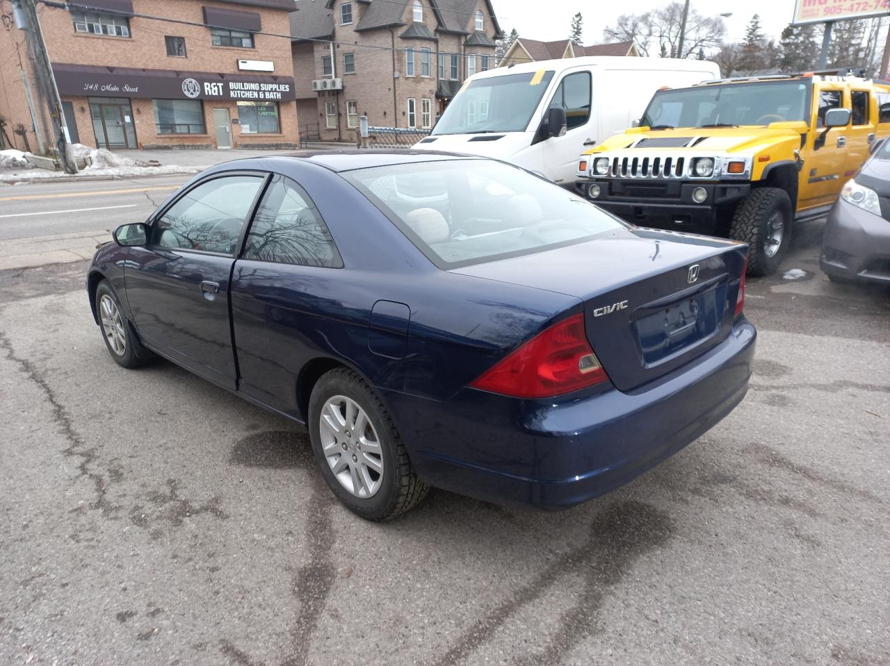 1HGEM22533L800942 2003 Honda Civic Lx