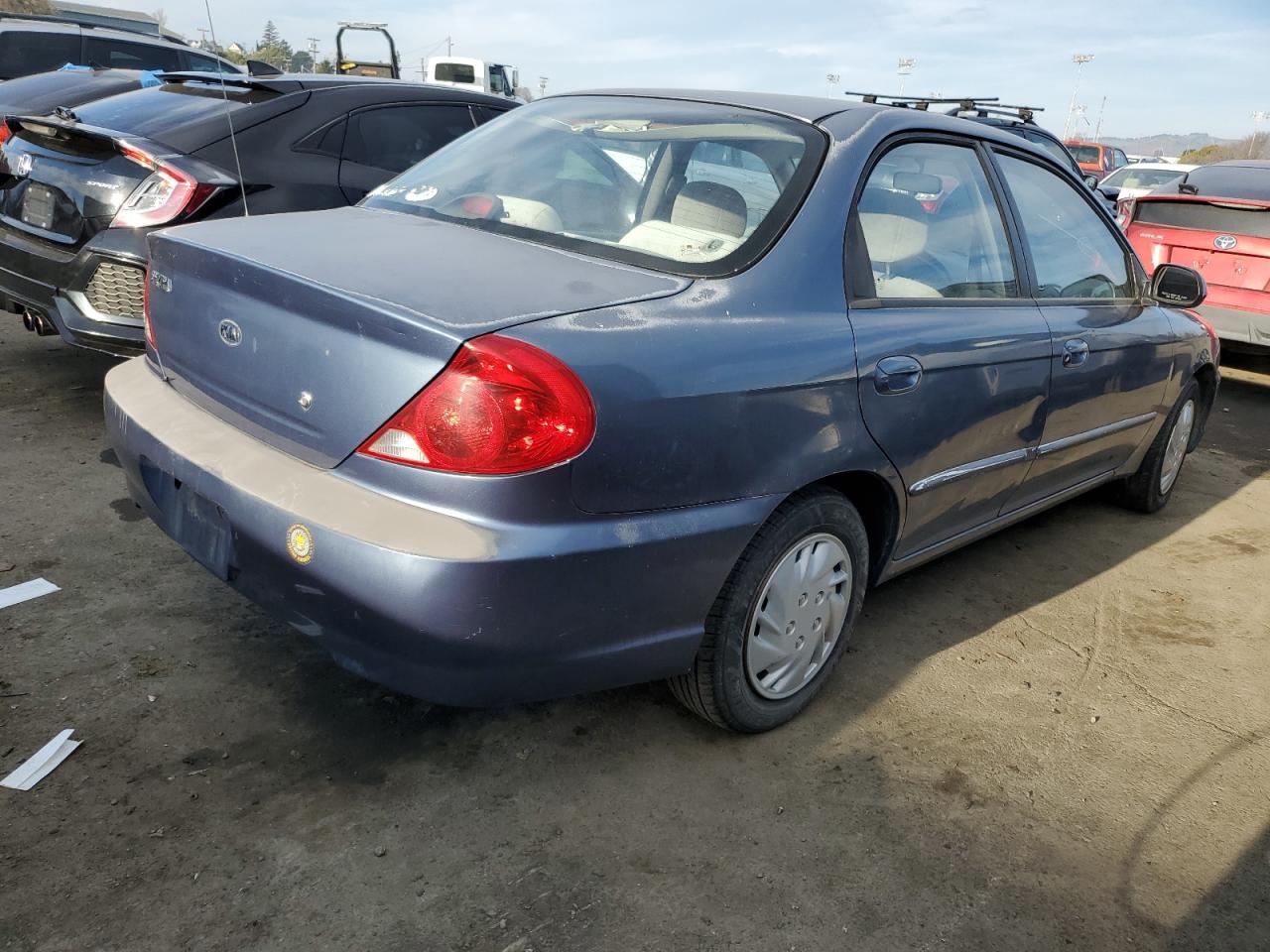 KNAFB121225207704 2002 Kia Spectra Base