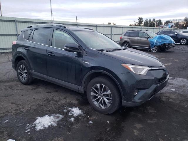 JTMRJREV8JD153880 | 2018 TOYOTA RAV4 HV LE