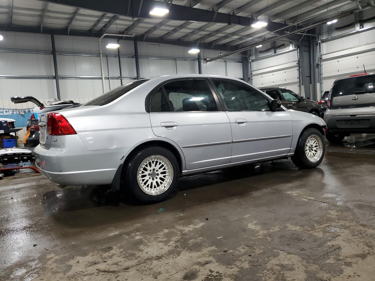 1HGES16542L013619 2002 Honda Civic Lx