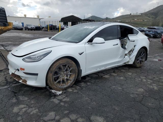 2019 Tesla Model 3  (VIN: 5YJ3E1EA9KF504086)