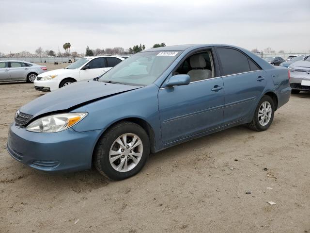 2004 Toyota Camry Le VIN: 4T1BF32K34U587795 Lot: 37824354