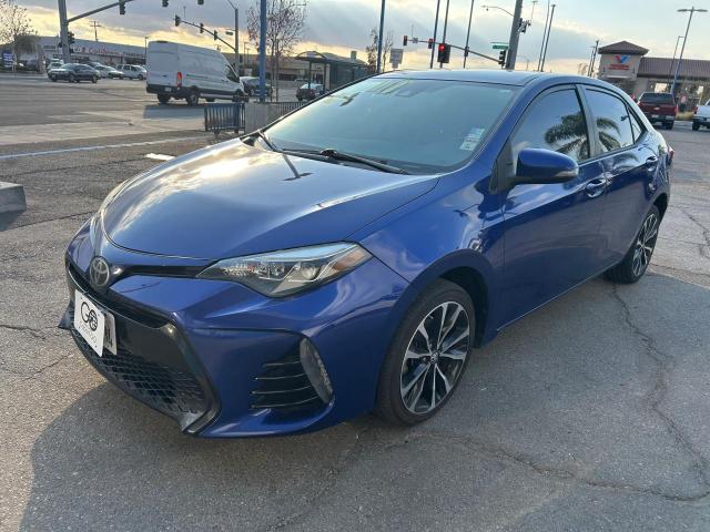 TOYOTA COROLLA L 2017 blue sedan 4d gas 5YFBURHE9HP707150 photo #3