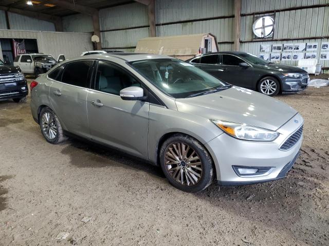 2015 FORD FOCUS TITA 1FADP3J24FL345429