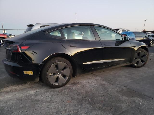 5YJ3E1EA0NF197329 Tesla Model 3 2022