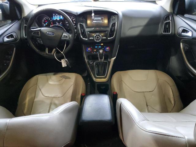2015 FORD FOCUS TITA 1FADP3J24FL345429