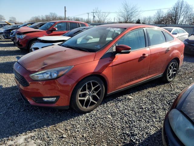 FORD FOCUS SE 2018 red  gas 1FADP3F28JL254696 photo #1