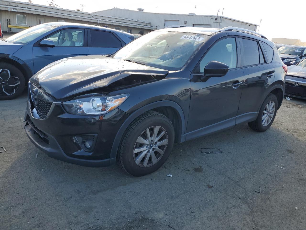  Salvage Mazda Cx