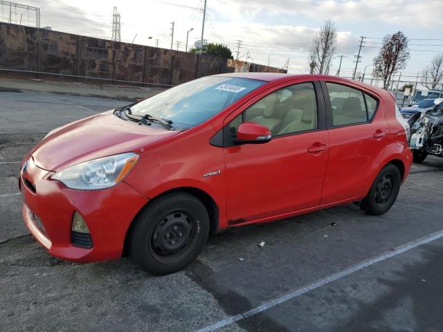 TOYOTA PRIUS C 2012 red hatchbac hybrid engine JTDKDTB35C1518092 photo #1