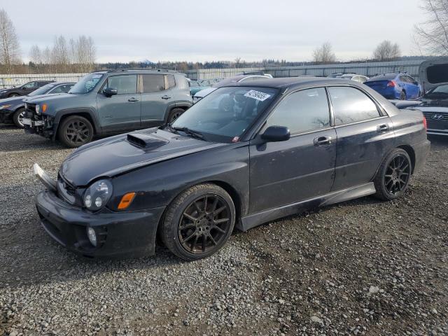 SUBARU IMPREZA WR 2002 black  gas JF1GD29642G522166 photo #1