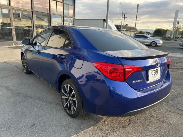 TOYOTA COROLLA L 2017 blue sedan 4d gas 5YFBURHE9HP707150 photo #4