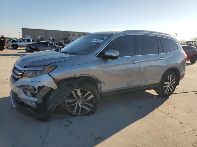 2016 HONDA PILOT TOUR 5FNYF5H93GB025066
