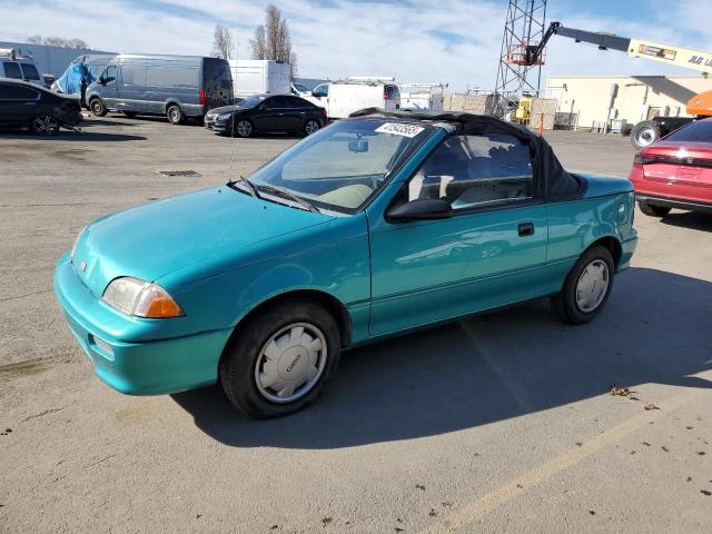 GEO METRO LSI 1993 turquoise converti gas JG1MR3367PK201491 photo #1