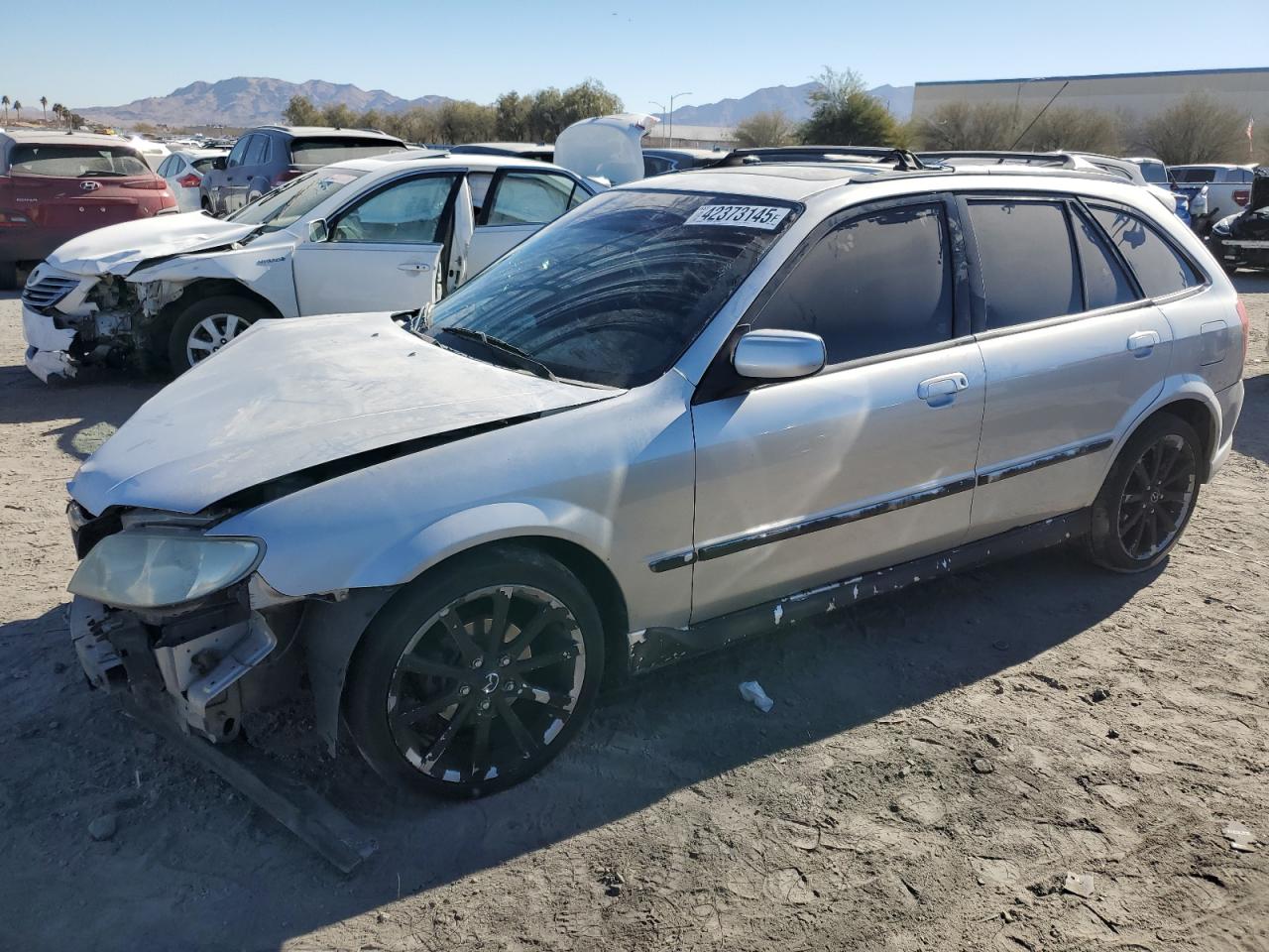  Salvage Mazda Protege