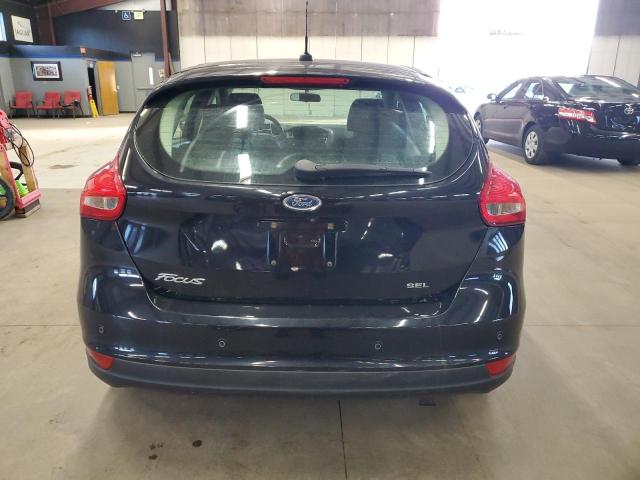 VIN 1FADP3M25JL208343 2018 FORD FOCUS no.6