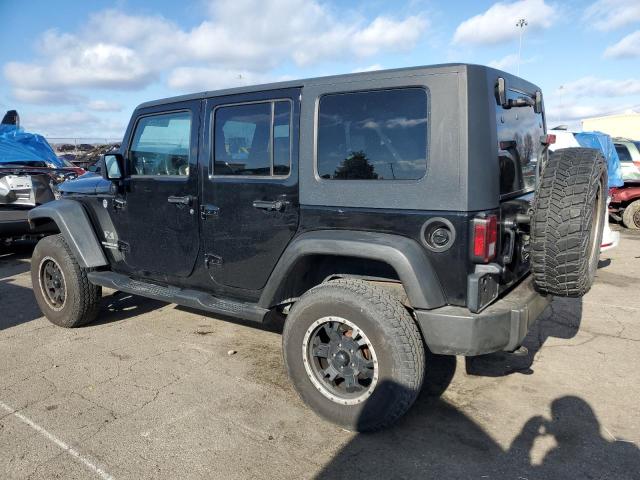 JEEP WRANGLER U 2009 black 4dr spor gas 1J4GA391X9L772701 photo #3