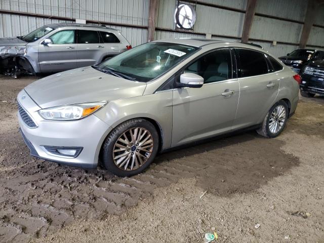 2015 FORD FOCUS TITA 1FADP3J24FL345429