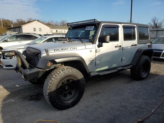 JEEP WRANGLER U 2012 silver 4dr spor flexible fuel 1C4HJWEG6CL194657 photo #1