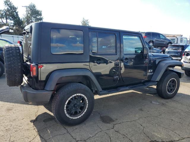 JEEP WRANGLER U 2009 black 4dr spor gas 1J4GA391X9L772701 photo #4